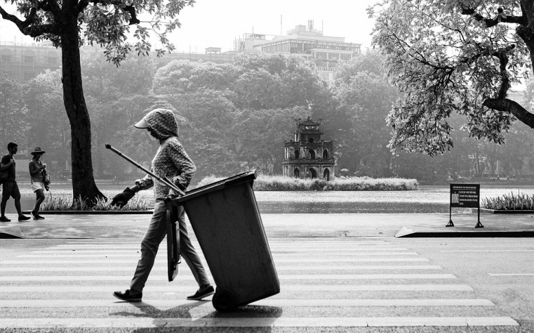 event cleanup staff collecting trash